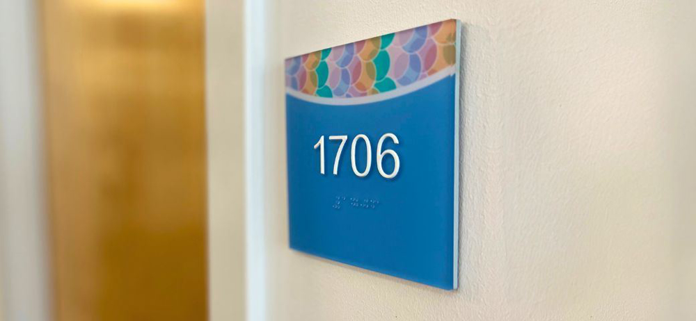 P95 frosted acrylic signage with a soft diffused finish